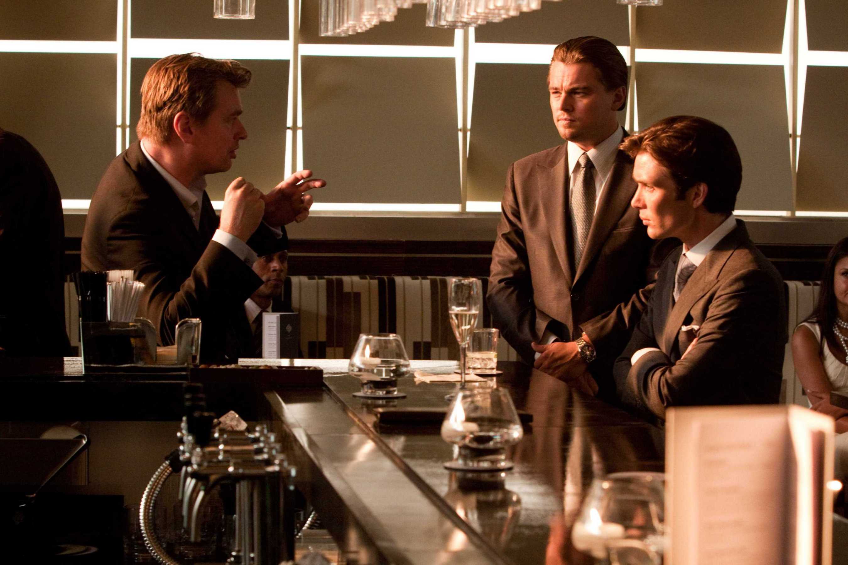 (L-r) Director CHRISTOPHER NOLAN with LEONARDO DiCAPRIO and CILLIAN MURPHY on the set of Warner Bros. PicturesÕ and Legendary PicturesÕ sci-fi action film ÒINCEPTION,Ó a Warner Bros. Pictures release.